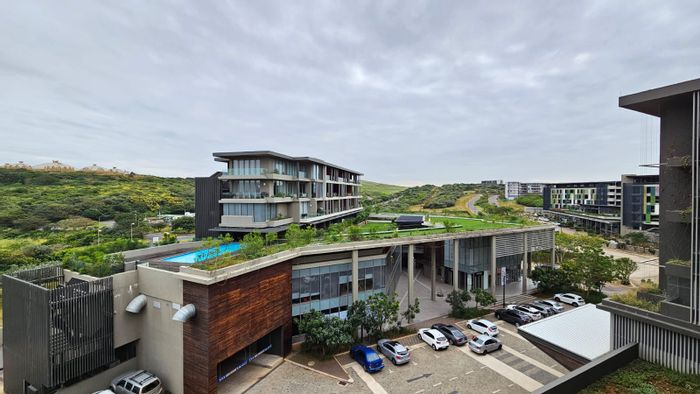 Sibaya Precinct Apartment For Sale: Furnished studio, pool, secure access, high-speed Wi-Fi.