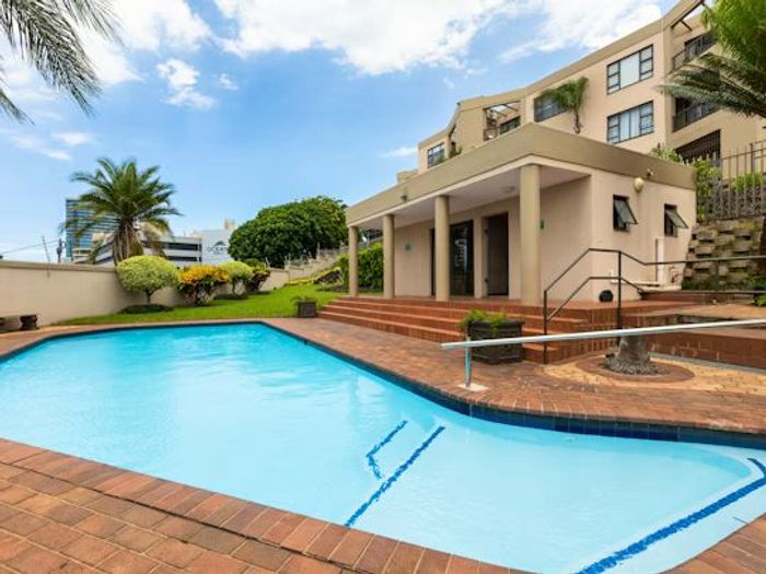 For Sale: 3-Bed, 2-Bath Apartment in Umhlanga Central with Covered Parking.