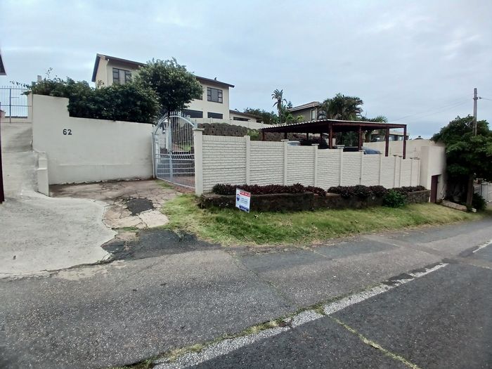 5-Bedroom House For Sale in Bluff with pool, bar, and ocean views.