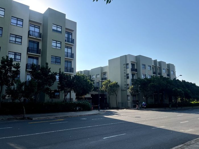 2-Bedroom Apartment For Sale in New Town Centre with pool, secure parking, and balcony.