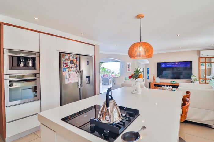 For Sale: Spacious 5-bedroom house in Umhlanga Ridge with pool and koi pond.