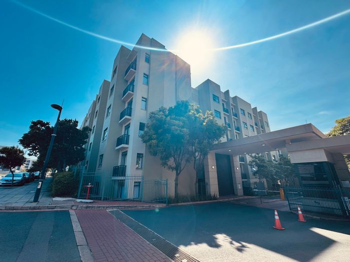 For Sale: Apartment in New Town Centre with secure access, pool, and workspace.