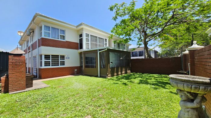 Townhouse To Rent in Mount Edgecombe Central: 3 beds, private garden, secure estate.
