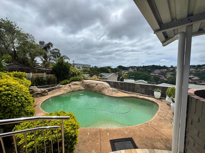 For Sale: 4-Bedroom House in Durban North Central with pool, solar, and staff quarters.