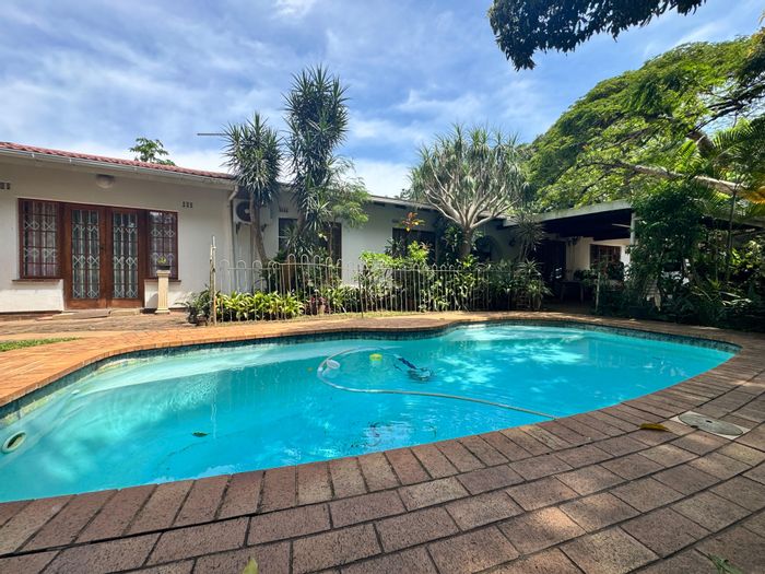 House For Sale in Durban North Central: Pool, flatlet, spacious living areas, garden.