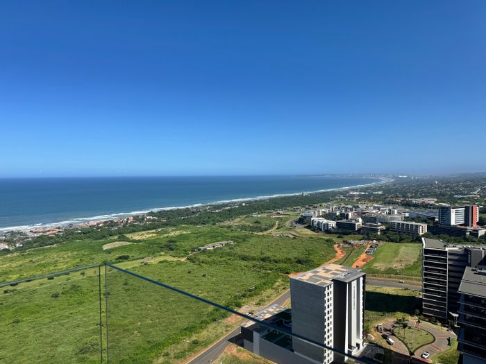 For Sale: Apartment in Umhlanga Ridge with sea views, security, and dining options.
