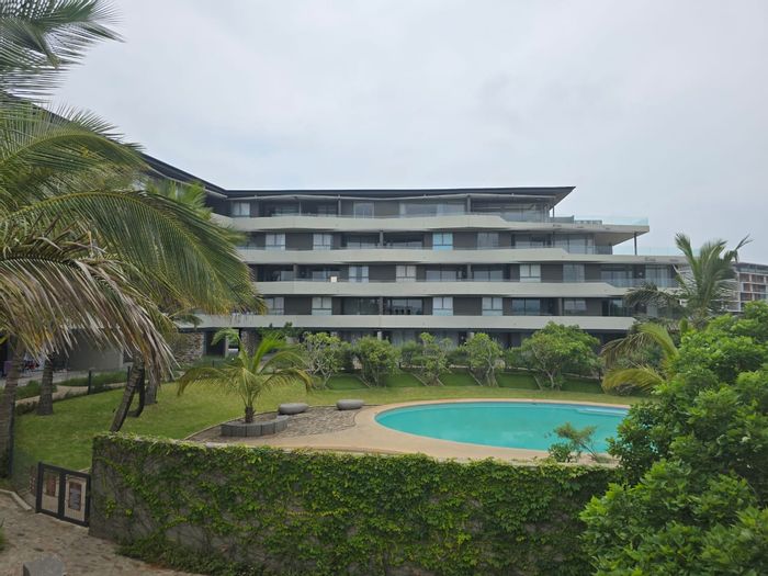 2-Bedroom Apartment To Rent in Sibaya Precinct with pool, balcony, and secure parking.