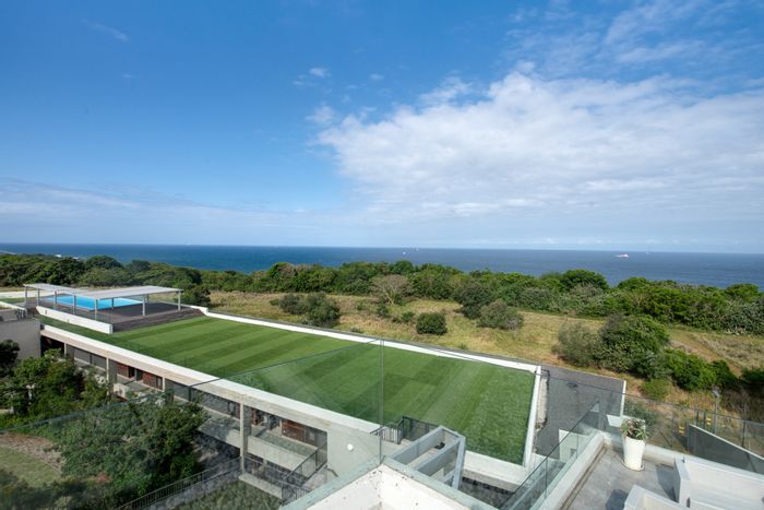 Sibaya Precinct Apartment To Rent: 4-bedroom penthouse with ocean views, pool, parking.