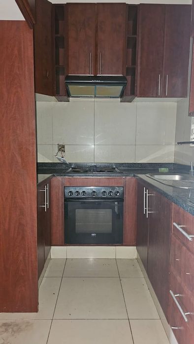 For Sale: Apartment in New Town Centre, 2 beds, secure parking, lifestyle amenities.