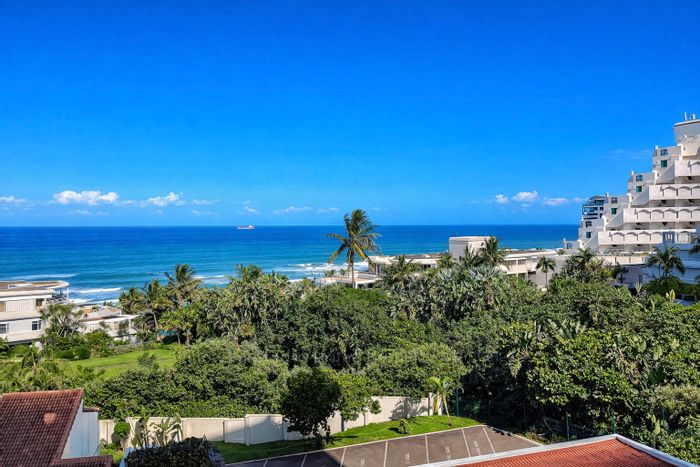 For Sale: Beachfront Apartment in Umhlanga Central with direct beach access and pool.