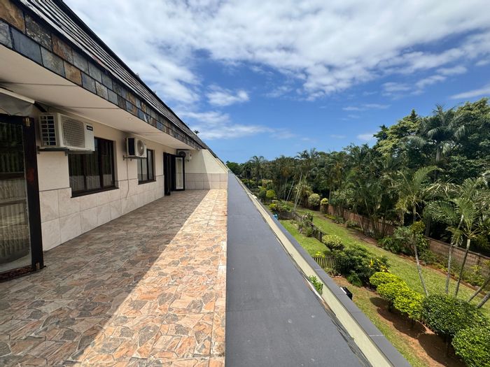 For Sale: Apartment in Durban North Central with 24-hour security and private patio.