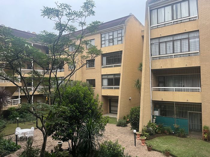 Two-bedroom apartment with parking, open plan living in Pietermaritzburg Central. To Rent.