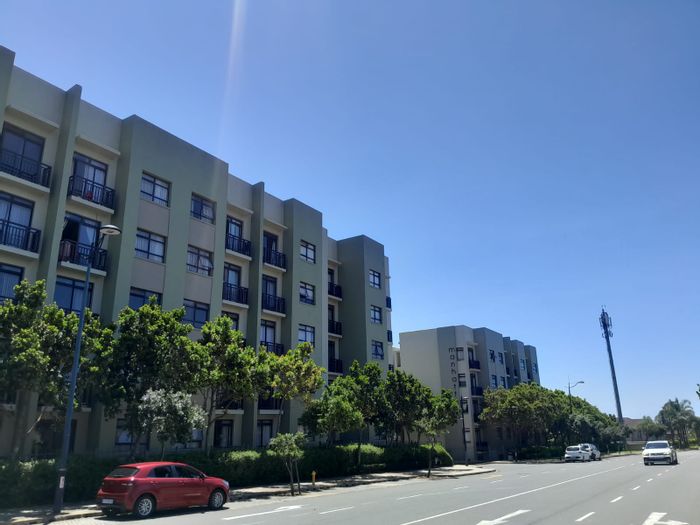 For Sale: Garden Apartment in New Town Centre with secure parking and communal pool.