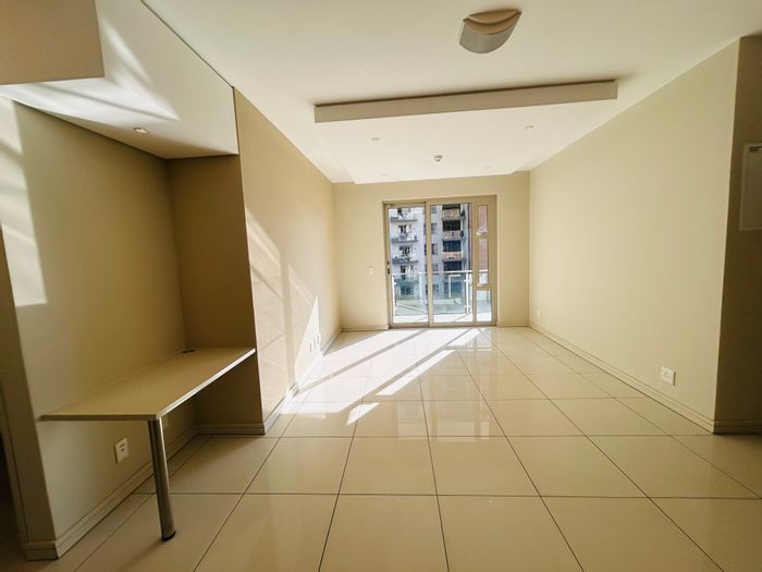 For Sale: 2-bed apartment in Rosebank with concierge, parking, and nearby amenities.