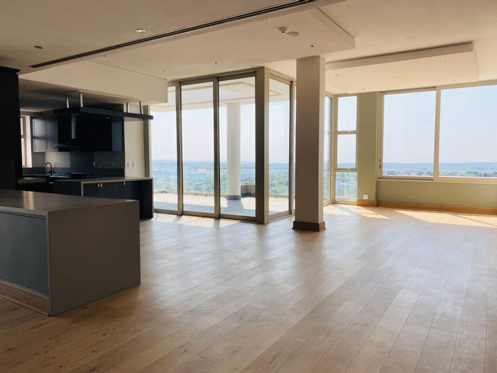 Rosebank Apartment To Rent: Penthouse with 2 beds, 3 living areas, and amenities.