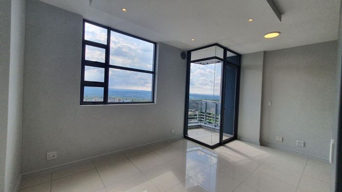 Rosebank Apartment To Rent: 1 bed, balcony, concierge, pet-friendly, near amenities.