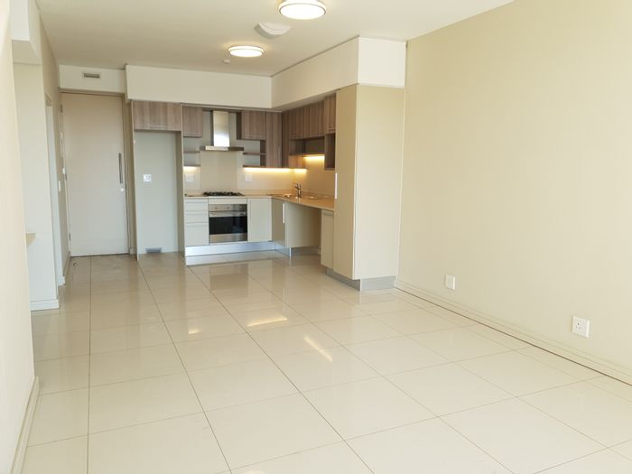 Rosebank Apartment For Sale: 2 beds, 24-hour security, near Gautrain and amenities.