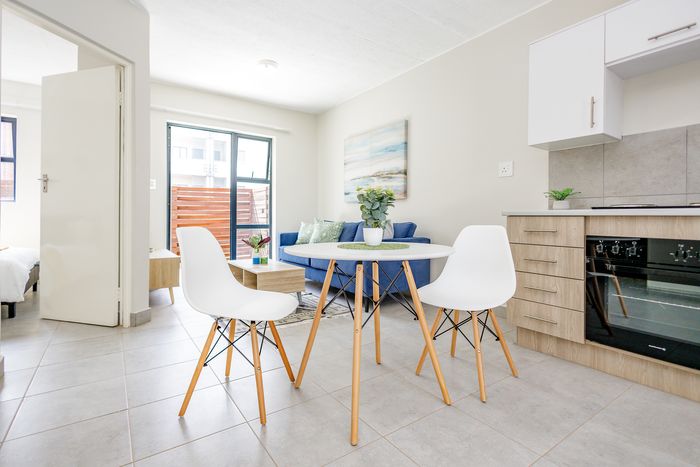 2 Bed Apartment For Sale in Ferndale with secure parking and rental income potential.