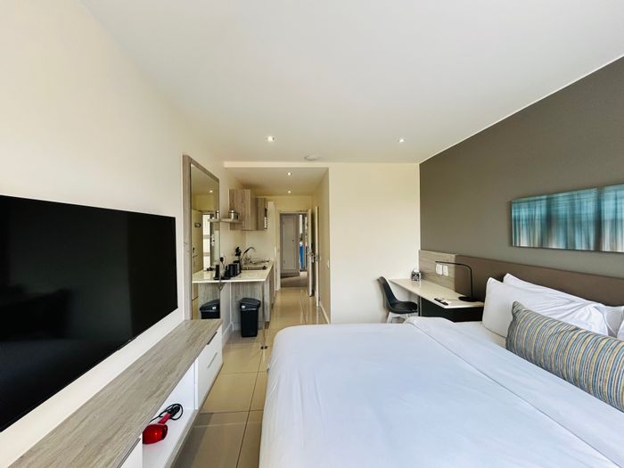 Furnished studio apartment in Rosebank with gym, pool, and secure parking. To Rent.
