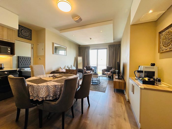 Furnished 2-bed apartment in Rosebank with backup power, parking, and amenities. For Sale.