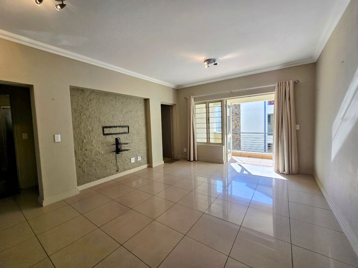 For Sale: 2-Bedroom Apartment in Parktown with Balcony, Parking, and Prime Location.