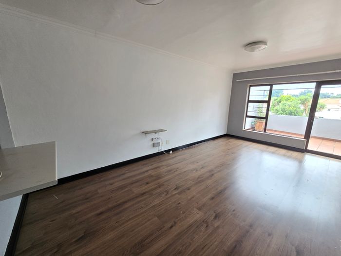 2-Bedroom Apartment For Sale in Weltevreden Park with Balcony and Pool Access.