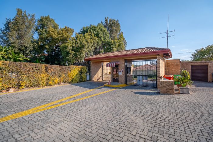 For Sale: House in Douglasdale with pool, security, and spacious patio.