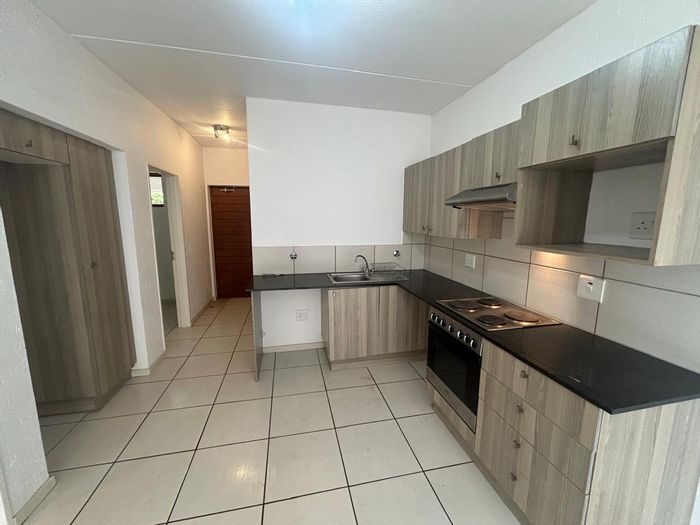 Paulshof Apartment For Sale: Ground floor unit with garden, pool, and security.