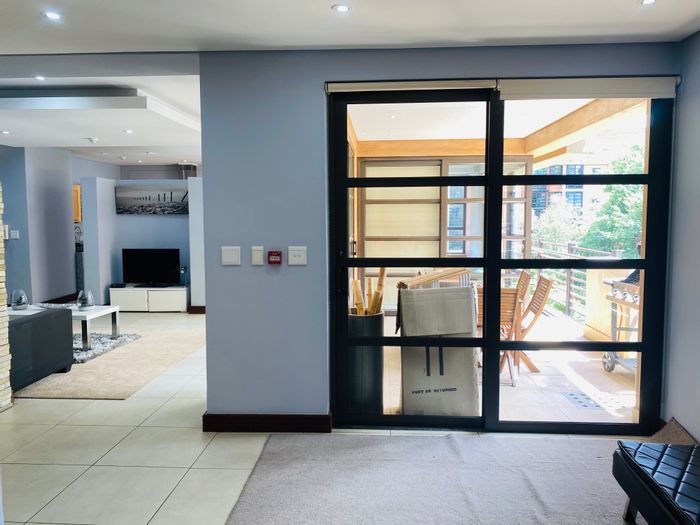 For Sale: Apartment in Melrose Arch with lap pool, 2 bedrooms, and secure access.