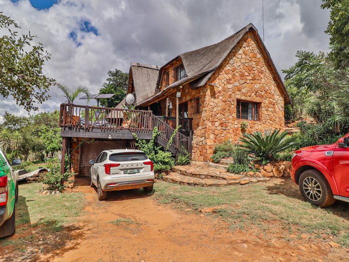 For Sale: House in Utopia Nature Estate with pools, trails, and exclusive chalets.