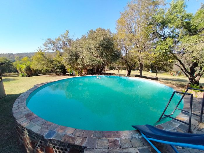 For Sale: 66.6-hectare farm in Swartruggens Central with diverse accommodations and amenities.