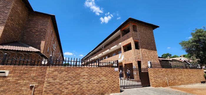 For Sale: 1-Bedroom Apartment in Rustenburg Central with Garage and Guest Parking.