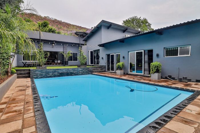 For Sale: Spacious 5-bedroom house in Protea Park with pool, gym, and staff quarters.