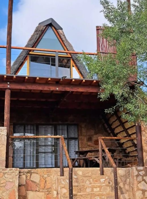 For Sale: A-Frame House in Utopia Nature Estate with solar, pools, and tennis courts.