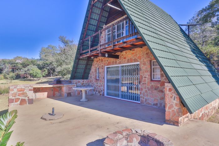 For Sale: House in Utopia Nature Estate with pools, tennis courts, and off-grid living.