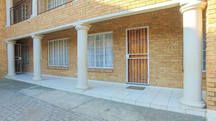 For Sale: 2-Bedroom Apartment in Rustenburg Central with Secure Parking and Open Layout.