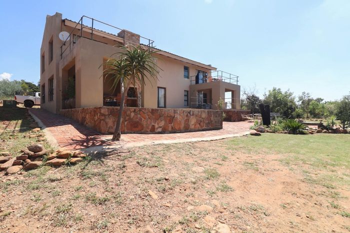 For Sale: House in Utopia Nature Estate with pools, trails, and stunning views.