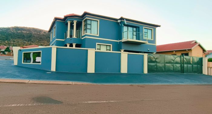 For Sale: House in Tlhabane West with 4 bedrooms, solar power, and security.