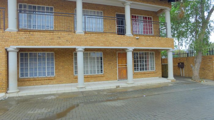 2-Bedroom Apartment For Sale in Rustenburg Central with parking, near transport and town.