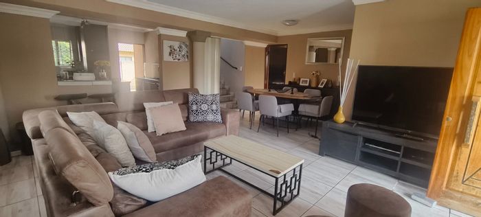 For Sale: House in Tlhabane West, 4 bedrooms, double garage, scenic balcony views.