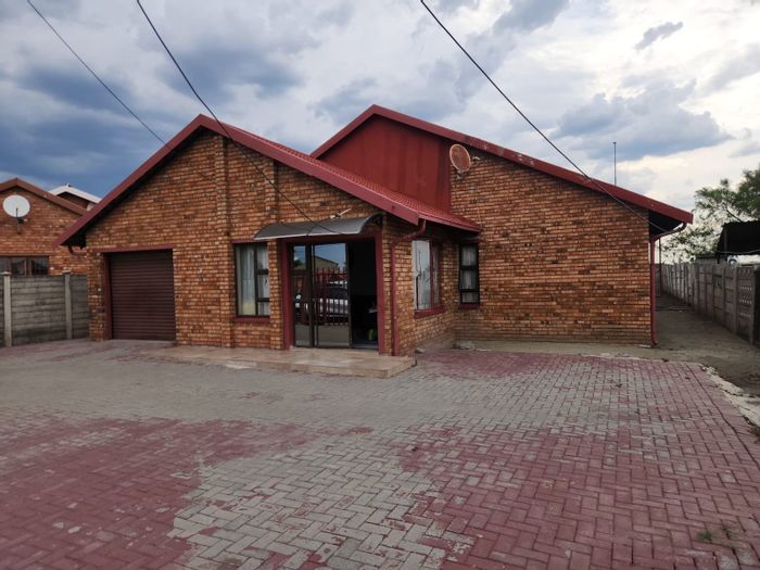 3-Bedroom House For Sale in Boitekong Ext 3 with secure fencing and ample parking.