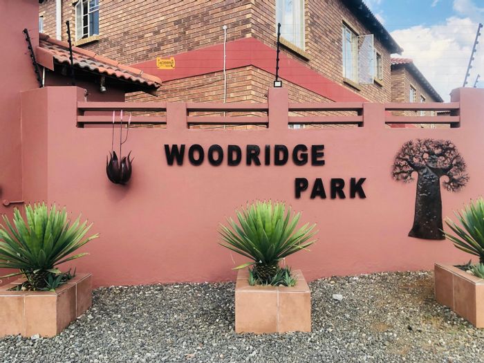 3-Bedroom Apartment For Sale in Waterval East with balcony, carport, and security.