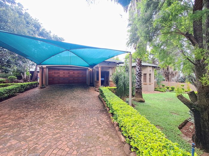 For Sale: House in Safari Gardens with pool, solar power, and ample storage.