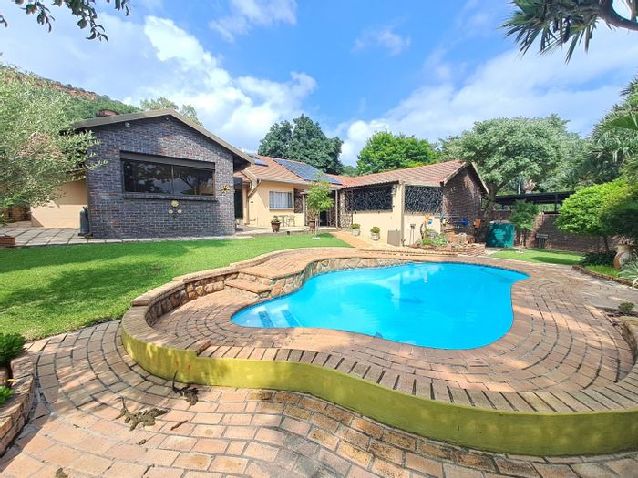 For Sale: House in Safari Gardens with off-grid power, borehole, and entertainment area.