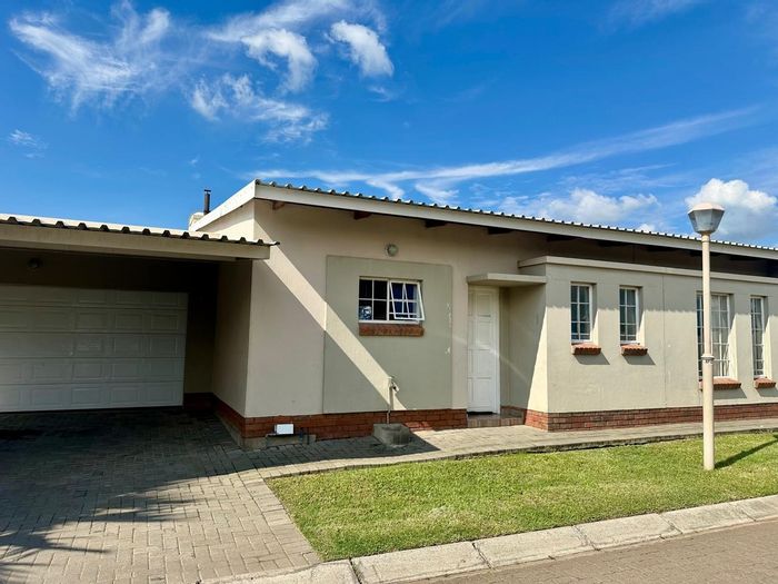 3 Bedroom Townhouse in Waterval East For Sale with patio, yard, and security.