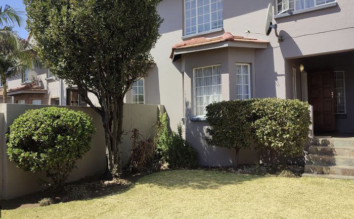 For Sale: Isandovale townhouse with garden, pool, tennis court, and 24-hour security.