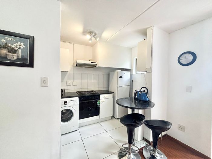 1-Bedroom Apartment To Rent in Sandown, featuring secure complex and furnished living.