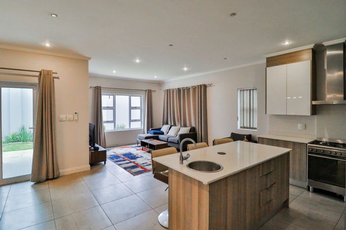 For Sale: 3-Bedroom Townhouse in Sandown with ensuite, double garage, and secure complex.