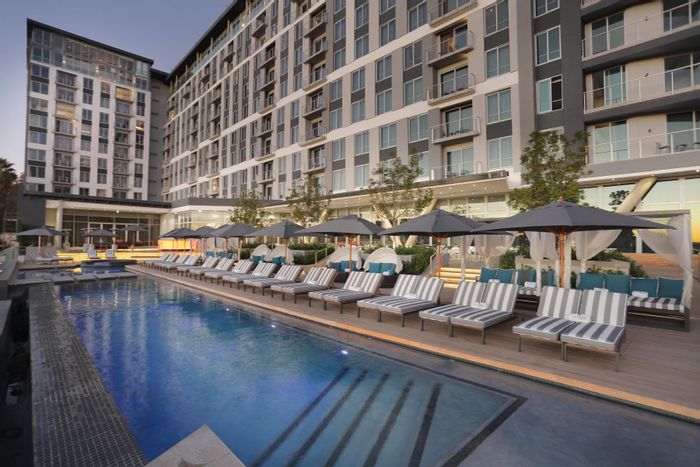 1-Bedroom Apartment For Sale in Sandown with hotel amenities and investment potential.