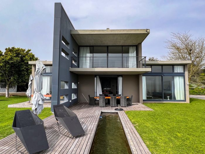 For Sale: 106ha Farm in Stellenbosch Farms with vineyards, dams, and luxury manor house.